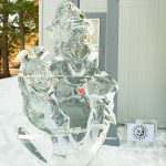 Ice sculpture of the Grinch from Grounded Massage